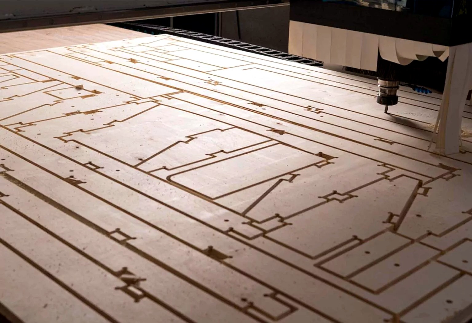 Real photograph of plywood CNC nesting and cutting